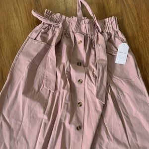 Mauve pink midi length skirt.